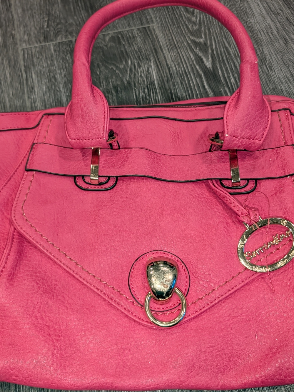 Vibrant Pink Leather Satchel with Gold Accents